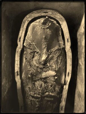 Tutankhamun’s veiled middle coffin, photographed within the tomb of Tutankhamun by Harry Burton (Burton photograph 0718), 17th October, 1925.